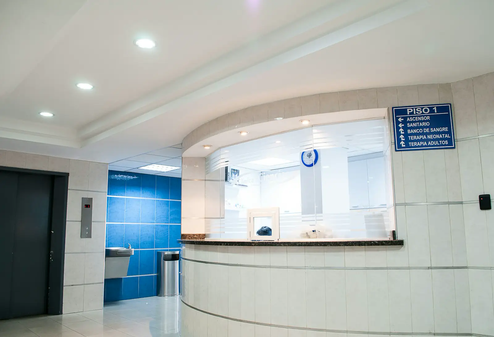 A bright, empty hospital corridor